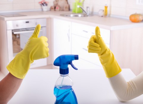 Local cleaners working on a kitchen in Roehampton before tenant handover